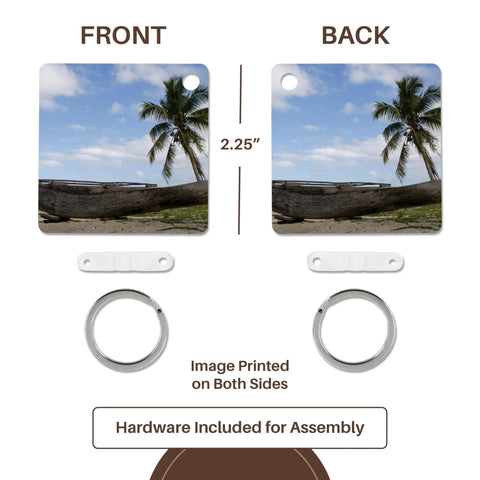 Outrigger Fishing Canoe Key Chain Set From Fiji front and back with palm tree design, heavy-duty plastic, 2.25 inches