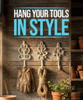 Distressed White Cast Iron Wall Hooks Set Of Three for hanging tools in a rustic wooden setting with gardening gloves and pots.
