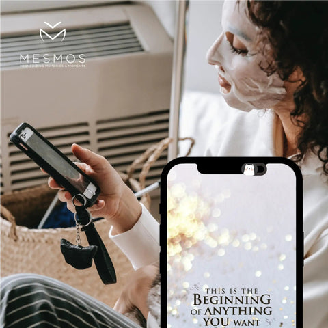 Slick Little Webcam Cover Slide For Laptops And Macbooks Featuring Adorable Cat Vibes on a phone with user holding it while relaxing.