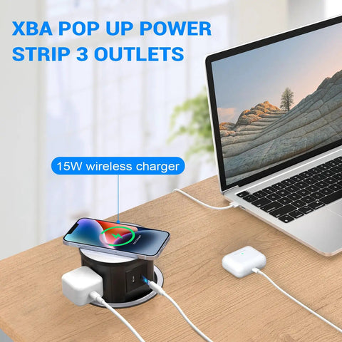 Pop Up Countertop Power Outlet With 20W USB C Fast Charge Hidden Recessed Socket Four AC Plugs And One USB A Port Top Qi Wireless Charger For Kitchen Four Point Seven Inch Built In Pop Up Outlet Black shown on desk with laptop and phone