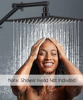 Person enjoying shower with adjustable 13 inch shower head extension arm, matte black, solid brass construction, shower head not included.