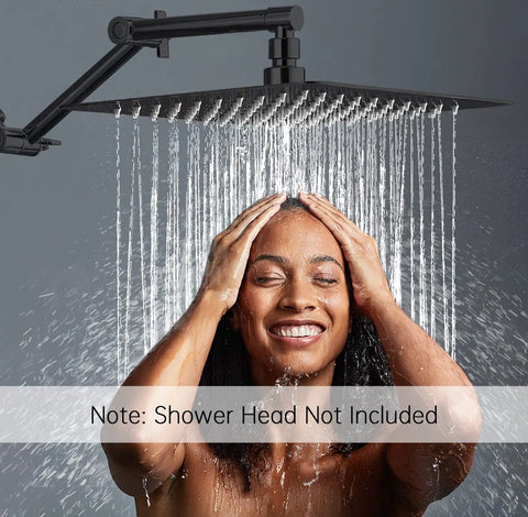 Person enjoying shower with adjustable 13 inch shower head extension arm, matte black, solid brass construction, shower head not included.