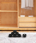 Non Slip Black PVC Furniture Pads Set With Metal Washers, shown with furniture, 120 count, anti skid rubber feet protectors.