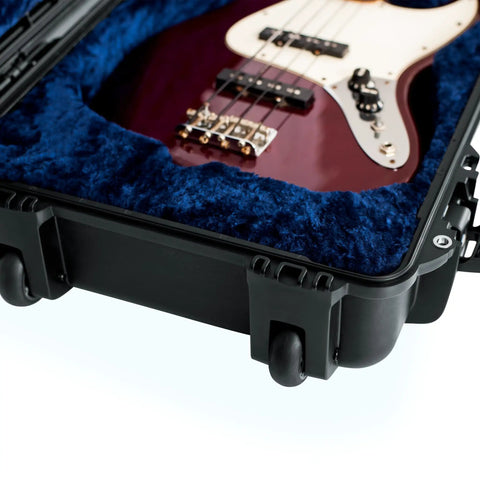 Titan Series Beefy Waterproof Bass Guitar Case for Jazz and Precision Styles IP67 Dustproof and Water Resistant Right Handed Lightweight NK-7 Resin Build ATA-300 Certified for Tough Travel bass case open with blue velvet lining and bass inside