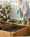 Person using Double Sided Pick Axe For Digging 16 Point 9 Inch Mattock With Non Slip Handle Beefy Heavy Duty Garden Hoe