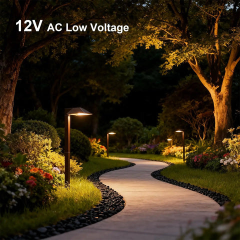 Low Voltage Landscape Path Lights 8 Pack Kit LED 22 Lumen Outdoor Walkway Pathway Lighting Wired Bronze Finish 3100K Warm White With Cable Connectors Easy Install For Your Yard illuminating a garden path at night.