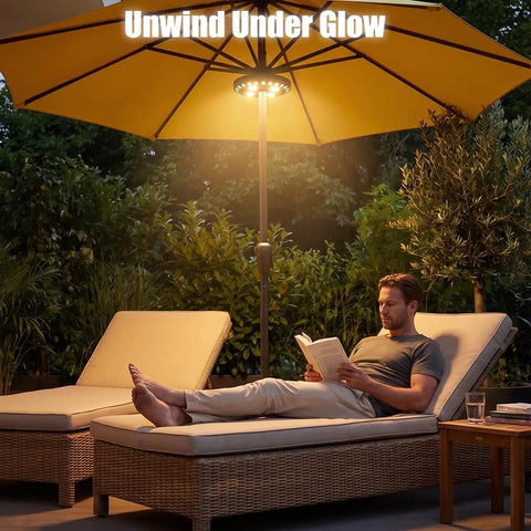 Warm White Cordless Umbrella Light With 3 Brightness Modes, 28 LEDs Up To 200 Lumens illuminating a patio with a person reading