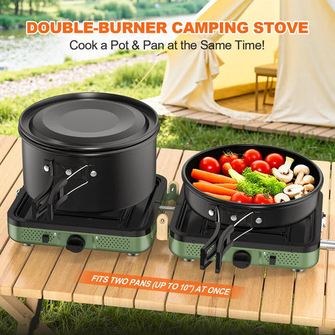 Two Burner Foldable Camping Stove With Carry Bag For Outdoor Cooking on wooden table with pots and fresh vegetables