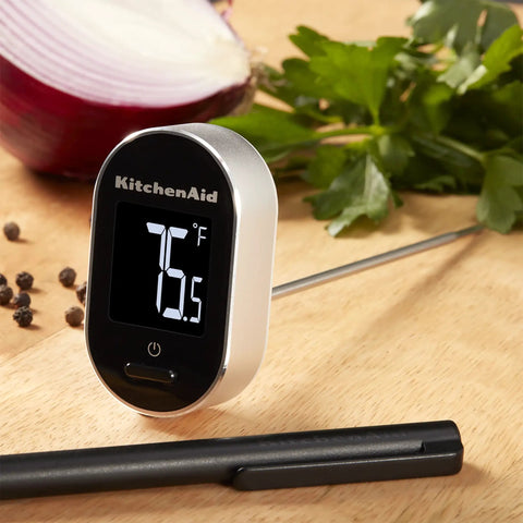 Digital Instant Read Kitchen Thermometer With Pivoting Backlit Display For Easy Reading From Any Angle, shown on countertop