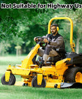 Person operating a zero turn mower with Flat Free 11x4.00-5 Front Lawn Mower Tire And Wheel Set With Solid Polyurethane Core