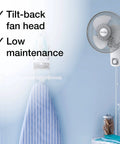 Commercial Grade Oscillating Wall Mount Fan, 12 Inch White Workhorse For Home, Office, And Shop installed in a room.