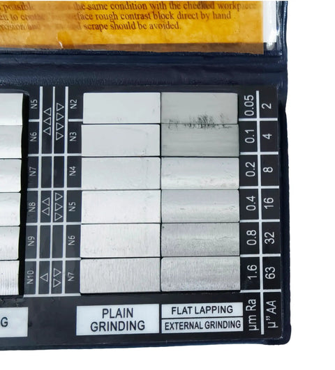 30 Piece Surface Roughness Standards Set With Ra 0.05 To 12.5um Comparators For Quick No Fuss Roughness Testing And Gauge Calibration In Manufacturing. close-up of Ra comparator blocks for plain grinding and flat lapping, metal surface finish chart