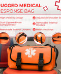 Orange EMT trauma bag, front view, with star of life logo and black straps.