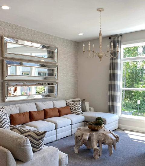 Montreal 29 Inch Six Light French Country Chandelier With Adjustable Height In Smoked Birch Finish in a bright living space.