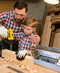 Father and son using Beast M35 Drill Bit Set For Hardened Metals And Woodworking 115 Pieces with metal index box in workshop.