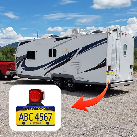 RV with Rugged Heavy Duty Aluminum Trailer License Plate Bracket Holder for universal plates, outdoor use shown.