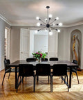 Dining room with Matte Black Sputnik Chandelier With 12 Lights Adjustable Modern Ceiling Fixture For Dining Room Kitchen Island Hallway Bedroom Vintage Industrial Vibe Style over table