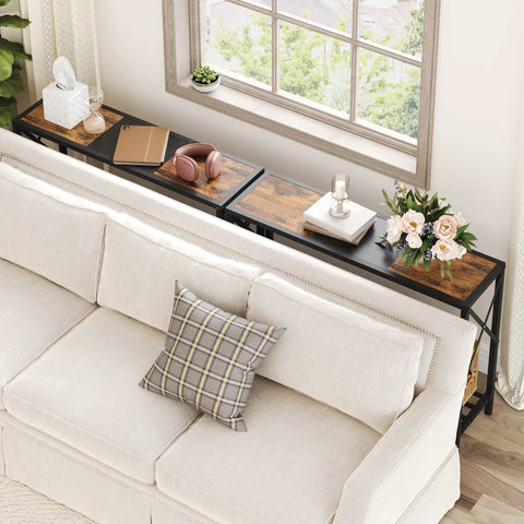 Smooth Vibes Two Tier Industrial Console Table With Open Storage Shelves For Tight Hallways Rustic Wood Surface Heavy Steel Legs Built Damn Tough No Hassle Setup Living Room Corner Unit above a couch with decorative items.