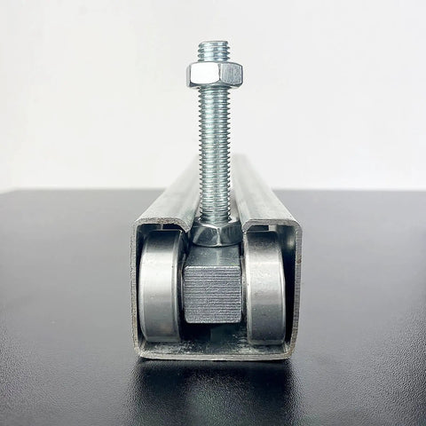 Front view of Four Wheel Unistrut Trolley Assembly with M12 Bolts for 1-5/8 inch wide strut channel silver rollers.