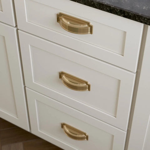 Top Shelf 3 Or 3.75 Inch Champagne Bronze Gold Cabinet Handles And Drawer Pulls For Kitchen Cabinets Bathroom Vanities Dressers Cupboards 10 Pack installed on white drawers.