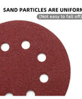 Close-up of Ultra Smooth 5 Inch Sanding Discs With Hooks For Orbital Sanders showing uniform sand particles and dust suction holes.