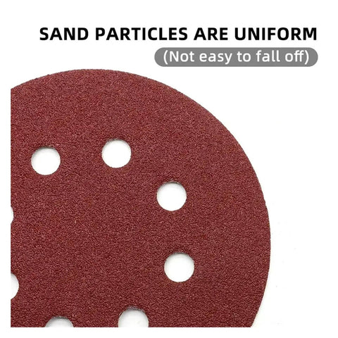 Close-up of Ultra Smooth 5 Inch Sanding Discs With Hooks For Orbital Sanders showing uniform sand particles and dust suction holes.