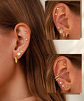 Gold Stud And Hoop Earring Set For Women With Eight Pairs Of Studs And Two Pairs Of Hoops, 14K Gold Plated CZ, Hypoallergenic Jewelry Gift, Dainty Flower And Heart Designs For Everyday Wear Or Night Out on ear model