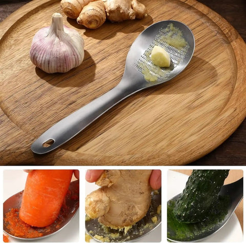 Ginger Grater Spoon And Lime Zester With Garlic Press And Wasabi Grinder on a wooden board, showcasing garlic and ginger use.