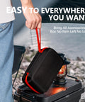 Person holding a carrying case for 6000A Jump Starter With Air Compressor For Cars And Trucks, 150 PSI Tire Inflator