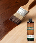 Water Based Wood Stain And Sealer In One Classic Walnut Finish 8.8 Oz Jar applied with brush on wood surface.