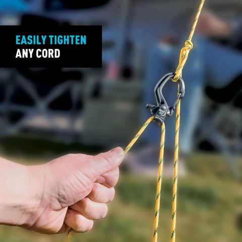 CamJam SlideLock Bungee Cord Tightener With Pull To Tighten Lock And Quick Release Lever used on yellow cord outdoors