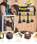Worker using tools next to Power Tool Organizer Wall Mount For Garage Heavy Duty Metal Tool Shelf Drill Holder Cordless Drill Storage