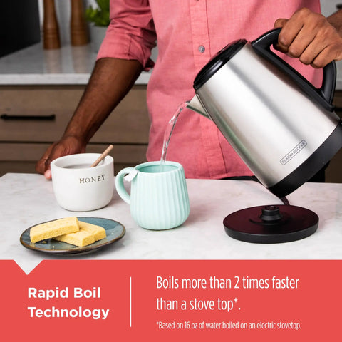 1.7L Cordless Electric Kettle With Rapid Boil Technology And Auto Shutoff, Stainless Steel Water Heater pouring into teacup.