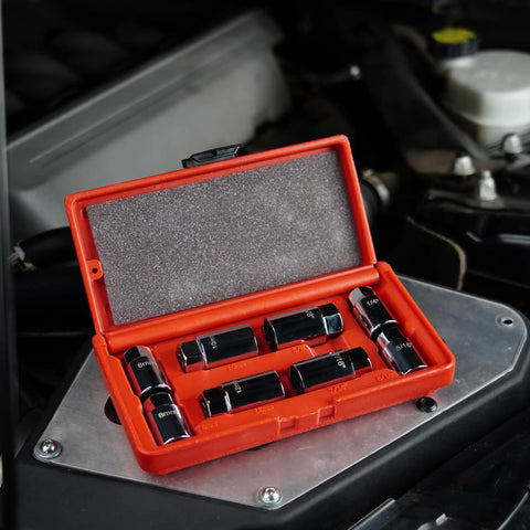 8 Piece Stud Extractor Set For SAE And Metric, Broken Stud Removal Sockets displayed in red case on automotive engine