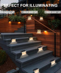 Diamond Solar Fence Lights 6 Pack Dope Outdoor Waterproof Deck And Step Lights illuminating stairs and deck at night.