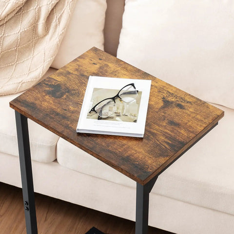 C Shaped End Tables Set Of 2 That Slide Under Your Sofa, rustic brown surface with magazine and glasses, Model HET02BBR