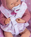 Close-up of baby doll in 2 In 1 Baby Doll Swing And Portable Carrier For 18 Inch Dolls Pink Play Set Ages 3 And Up