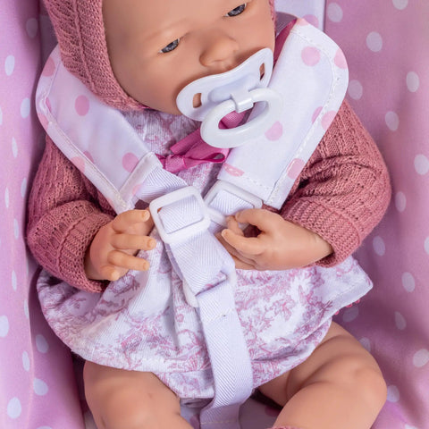 Close-up of baby doll in 2 In 1 Baby Doll Swing And Portable Carrier For 18 Inch Dolls Pink Play Set Ages 3 And Up