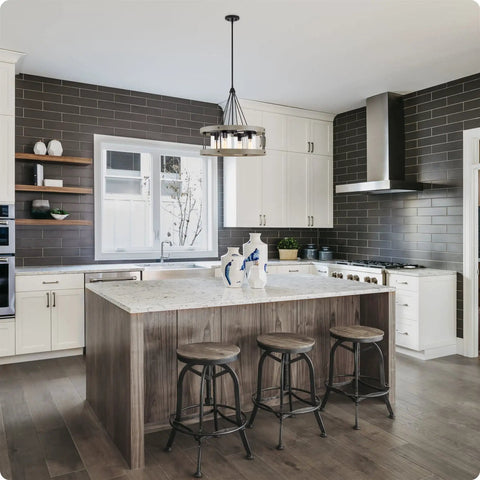 Hayden 25 Inch 4 Light Modern Farmhouse Drum Pendant Light With Cylinder Glass Shades in Gray Oak Finish hanging in kitchen