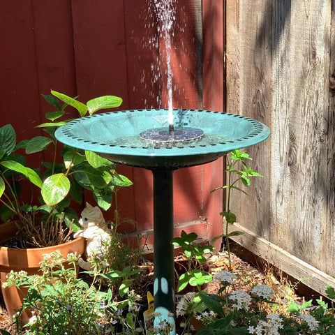 28 Inch Tall Outdoor Bird Bath With Solar Water Fountain Plastic Retro Green Bird Bath in garden setting.