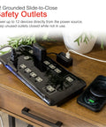 Turn One Outlet Into Twelve With Tethered USB Ports Surge Protector, 8 Ft Cord, Flat Plug, 4320 Joules, Power Filter, Circuit Breaker, UL Listed, Black, Extra Wide Spaced Outlets, Warranty Included on wooden table with devices plugged in