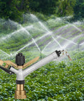 Long Range Impact Sprinkler For Lawns And Farms With 360 Degree Coverage, 1.5-Inch Inlet in action on large green farm area