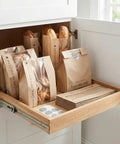 Clear Window Bread Bags For Homemade Bread Keep Sourdough Fresh For Days And Make Gifting Your Bakes A Breeze Eco Friendly Kraft Paper Packaging For Bakery Goods displayed in a kitchen drawer with baguettes.