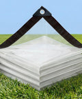 Crystal Clear Waterproof Tarp 4x6 Feet Extra Thick 8 Mil Vinyl UV Resistant Tear Proof With Reinforced Grommets on grass
