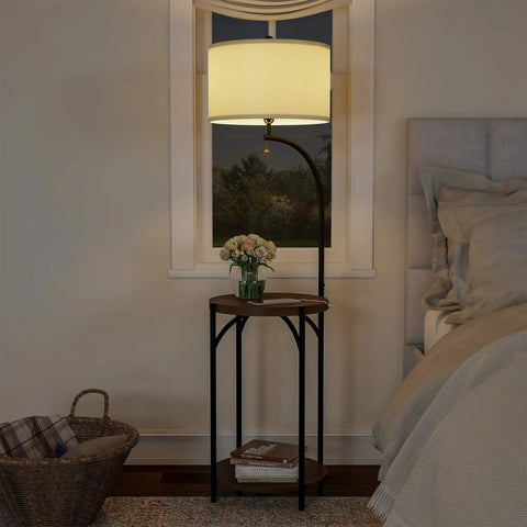 Go-To Space Saving Floor Lamp With End Table And USB Port next to bed, rustic wood grain MDF, iron frame, drum shade, 58 inches tall