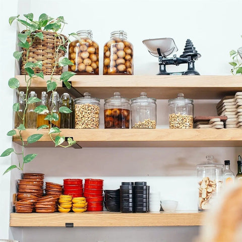 Knockout Heavy Duty Shelf Brackets For Floating Shelves Built Like A Tank With Solid As A Rock Iron Design Slick Industrial Wall Mount Brackets Black holding jars and decorative items.