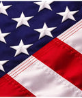 Close-up of 3x5 Outdoor American Flag With Embroidered Stars And Sewn Stripes, Built To Last Heavy Duty 400D Polyester, UV Fade Resistant.