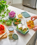 24 Piece Glass Food Storage Set With Airtight Lids, Leakproof BPA Free Meal Prep Containers on kitchen countertop