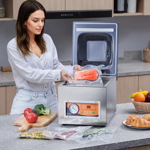 Heavy Duty Chamber Vacuum Sealer Boasts A Snappy 260 Watt Motor Generating Serious Suction To Handle Wet Grub Meats And Sauces Like A Boss While Keeping Your Kitchen Stock Fresh Inside A Compact Design Setup with salmon being sealed.