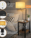 LED Floor Lamp With End Table And USB Ports RGB Color Changing Lights Built In Power Outlet beside a sofa in a living room